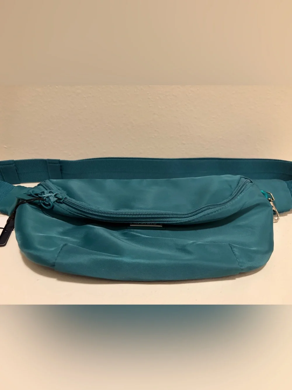 The Foldie Teal Waist Crossbody Bag RFID Blocking Travel Hand Free NWT
